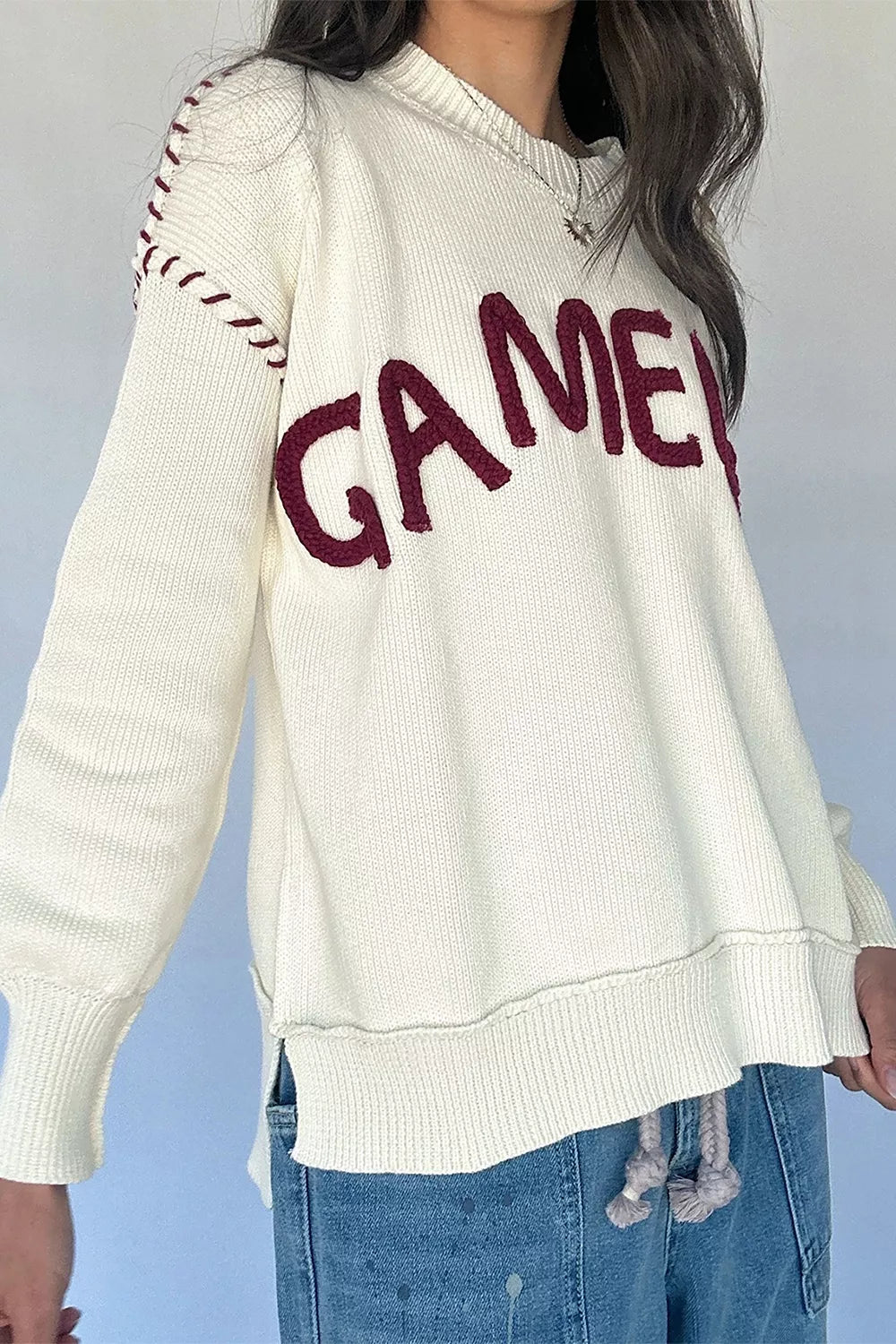 Trendsi drop shoulder game day letter sweater in gray, featuring bold team logo and casual fit, ideal for sports fan apparel.