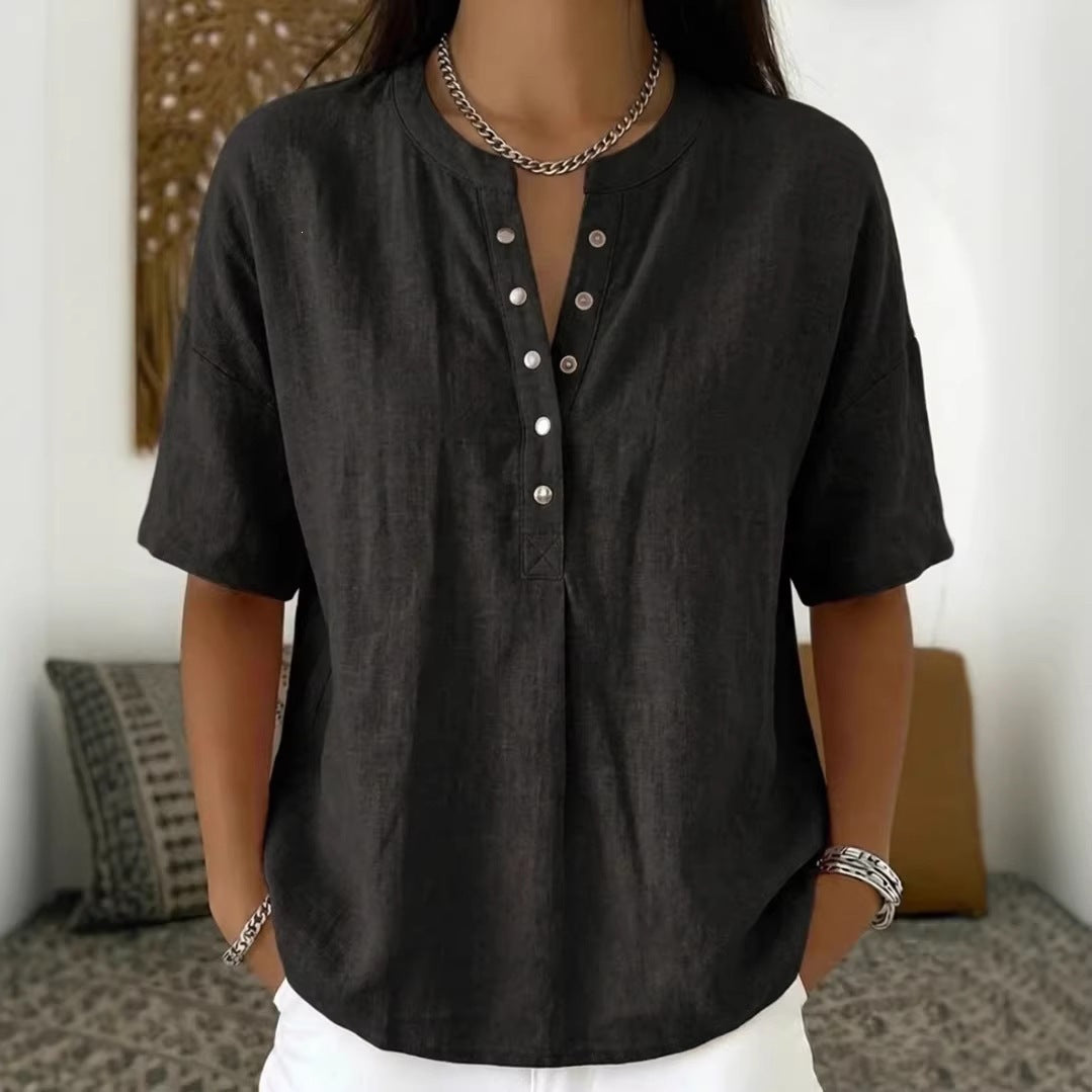 Women's solid color loose-fit short-sleeve pullover top by FitiqueFit, casualwear style, shown in a relaxed fit on a model.