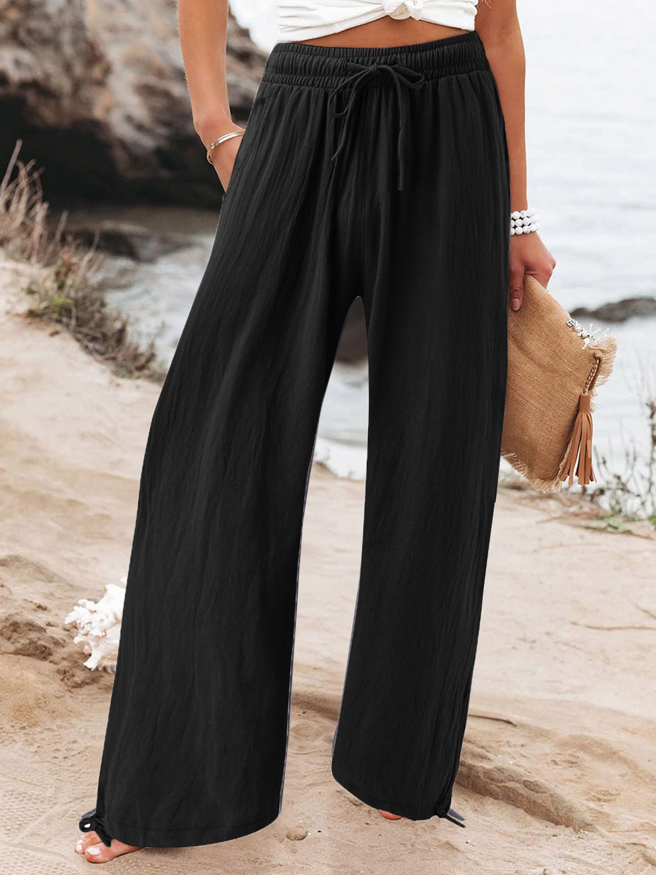 Plus size full length drawstring wide-leg pants from Trendsi, featuring a relaxed fit and comfortable waistband.