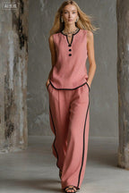 Women's minimalist sleeveless two-piece casualwear set by FitiqueFit, featuring a sleek top and matching skirt.