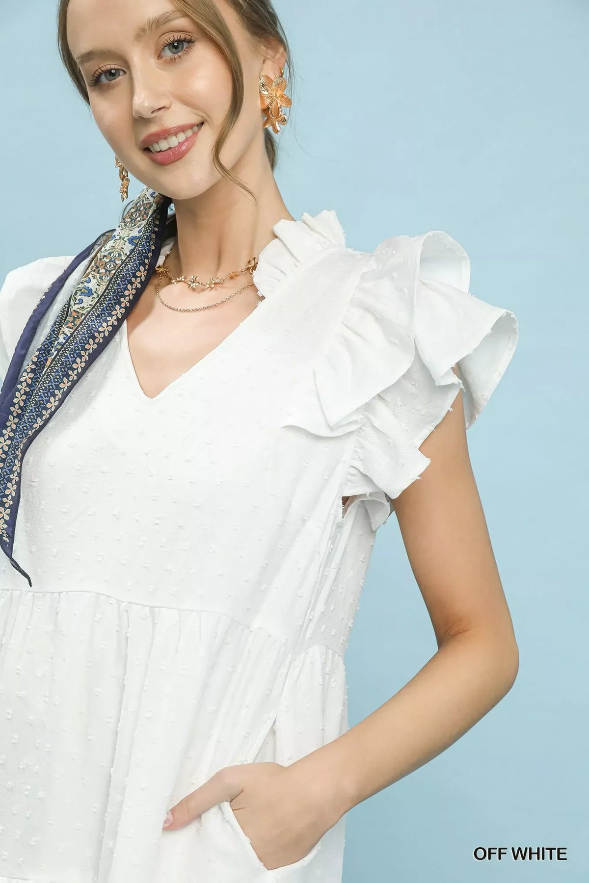 Plush Fashion Hub Umgee textured ruffle sleeve tiered midi dress with flowing fabric and layered design, perfect for stylish occasions.