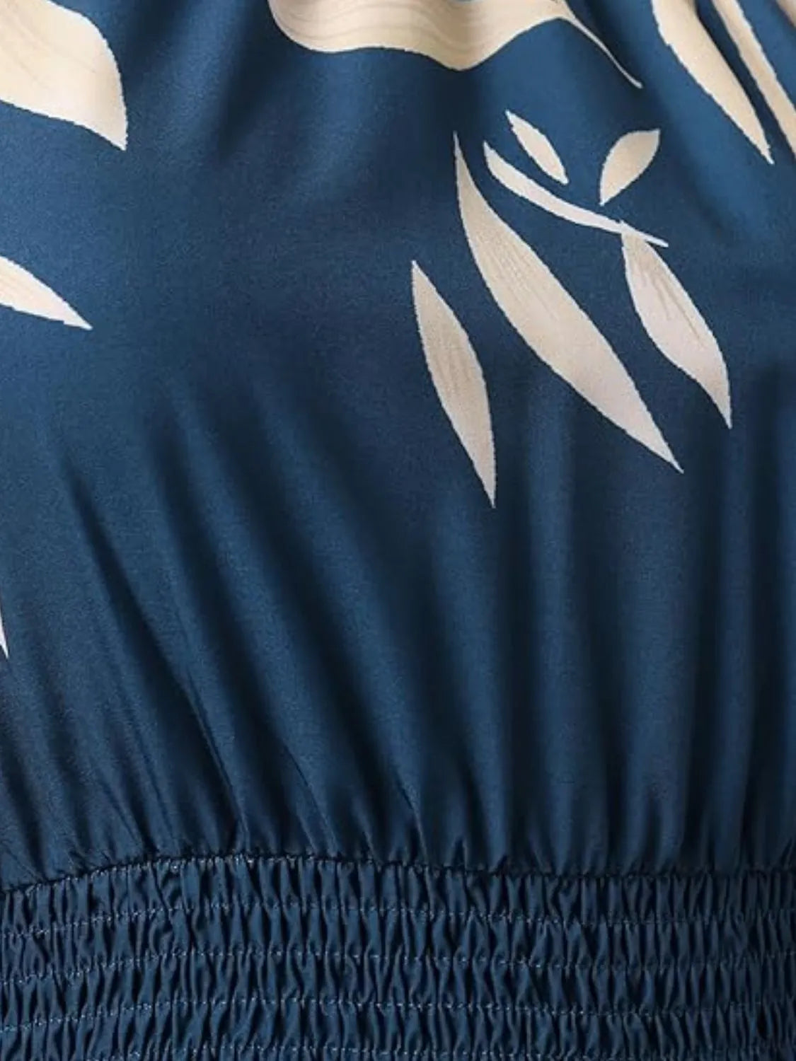 Paisley print halter neck mini dress by Plush Fashion Hub, featuring a stylish mini dress with a vibrant paisley pattern and halter neckline.