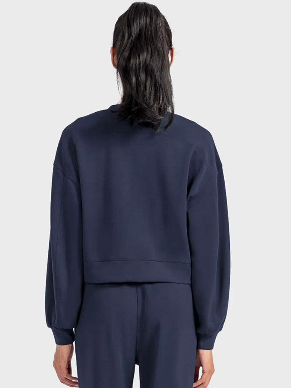 Plush Fashion Hub Millennia round neck drop shoulder sports top in soft fabric, designed for comfort and casual style.