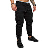 Men's black woven casual pants, featuring a slim fit and elastic cuffs, perfect for stylish everyday wear.