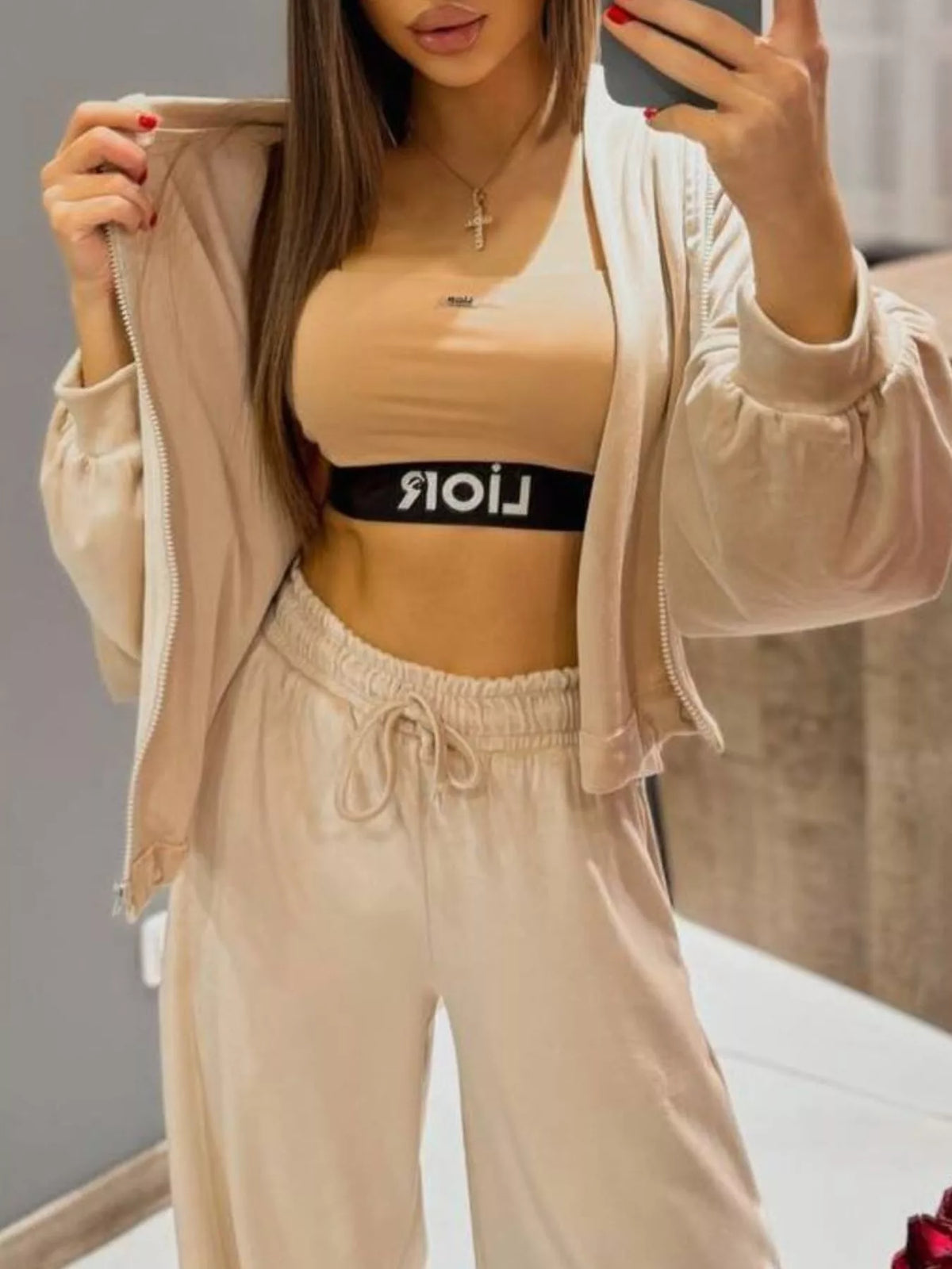 Plush Fashion Hub zip-up cropped outerwear and pants set, featuring a coordinated matching design in soft fabric.