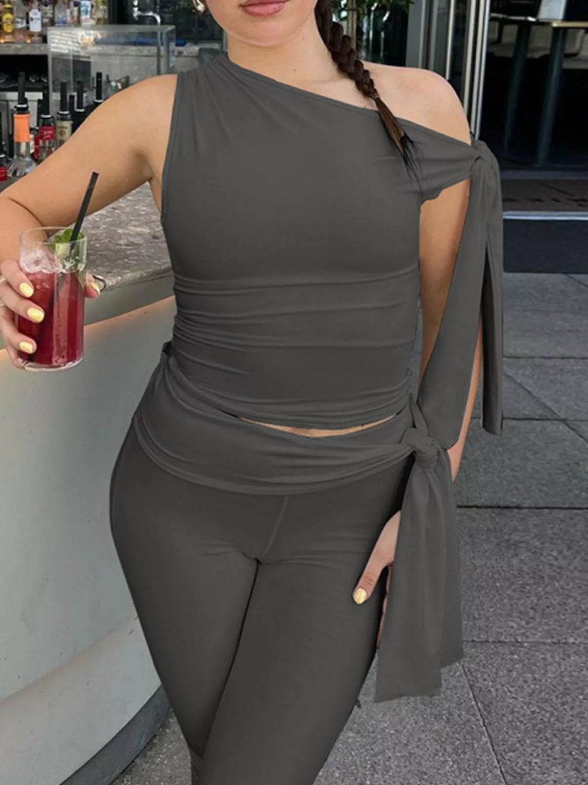 Asymmetrical one-shoulder top and matching capris set by Plush Fashion Hub, stylish women's casual outfit on a model.