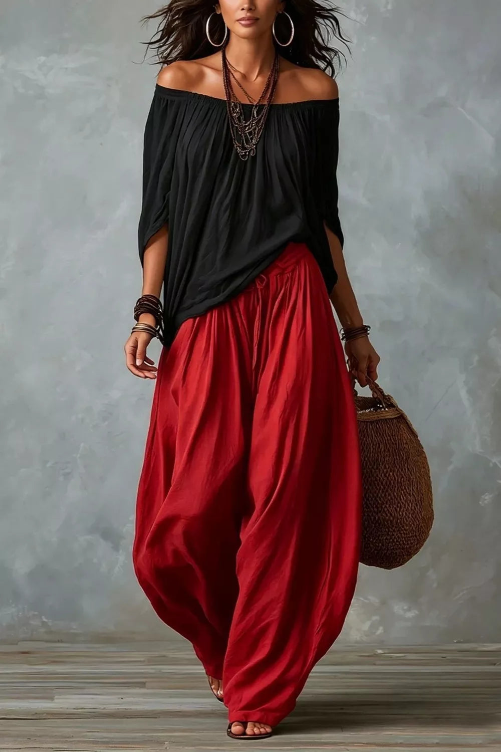 Plus size off-shoulder top and wide-leg pants matching set by Trendsi, featuring a stylish, comfortable ensemble with a relaxed fit.