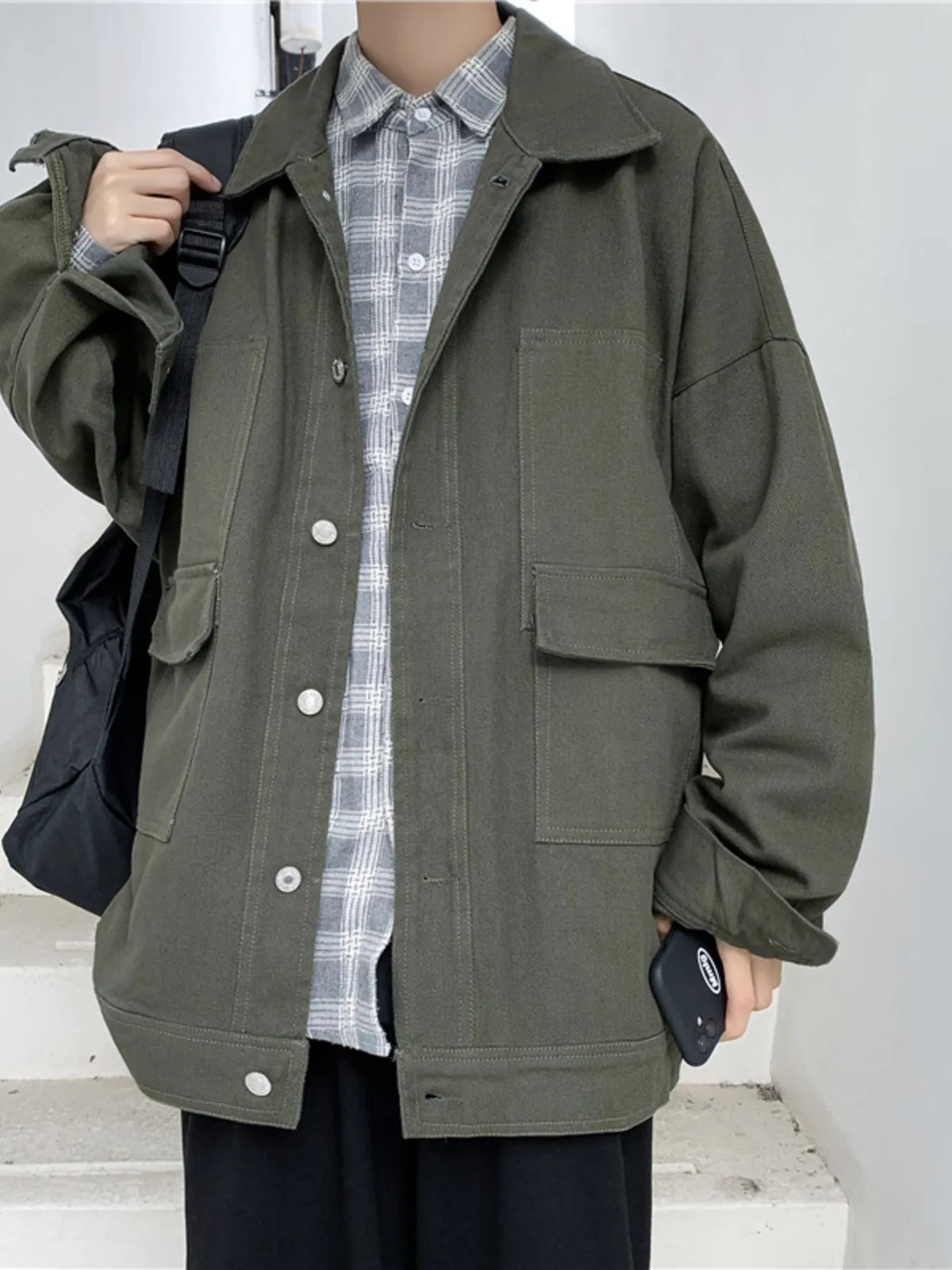 Men's drop shoulder denim jacket by Trendsi, featuring button-up front and casual style, shown on a plain background.