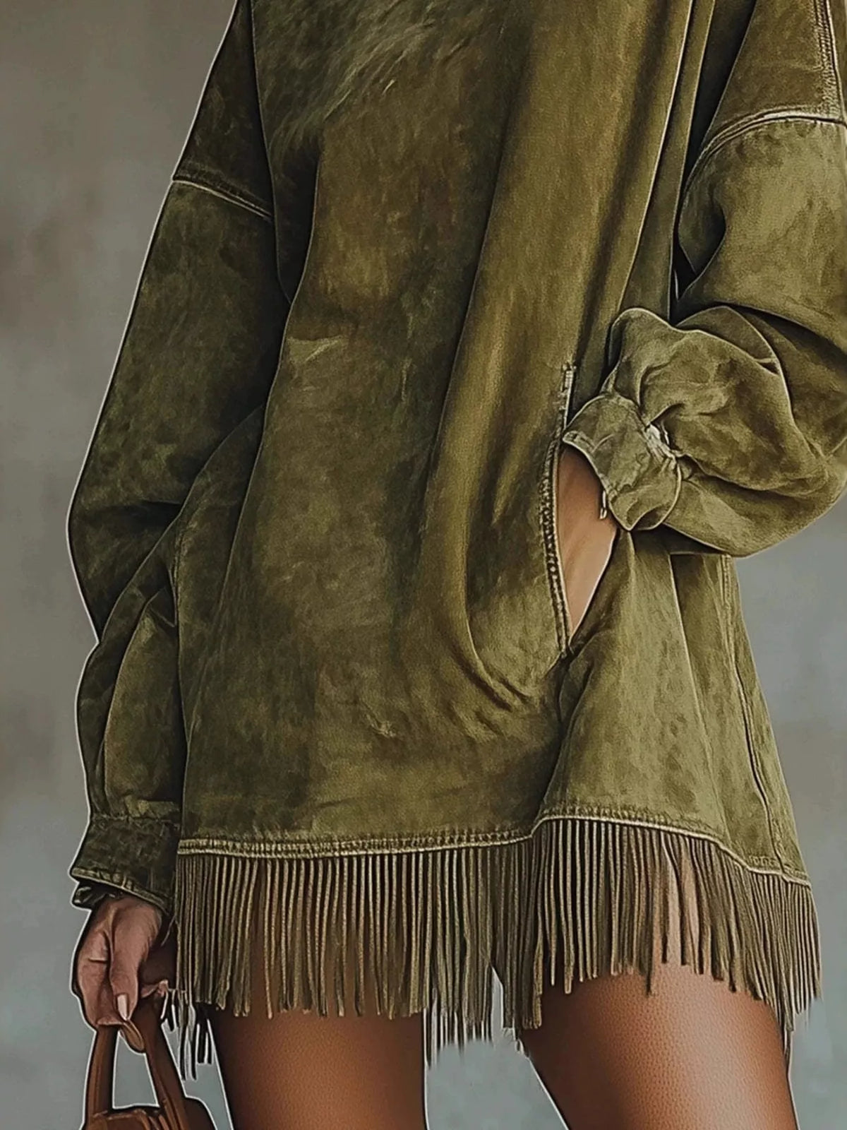 Plus size full-length mock neck fringed hem long sleeve mini dress by Trendsi, featuring sweater-knit fabric and stylish design.