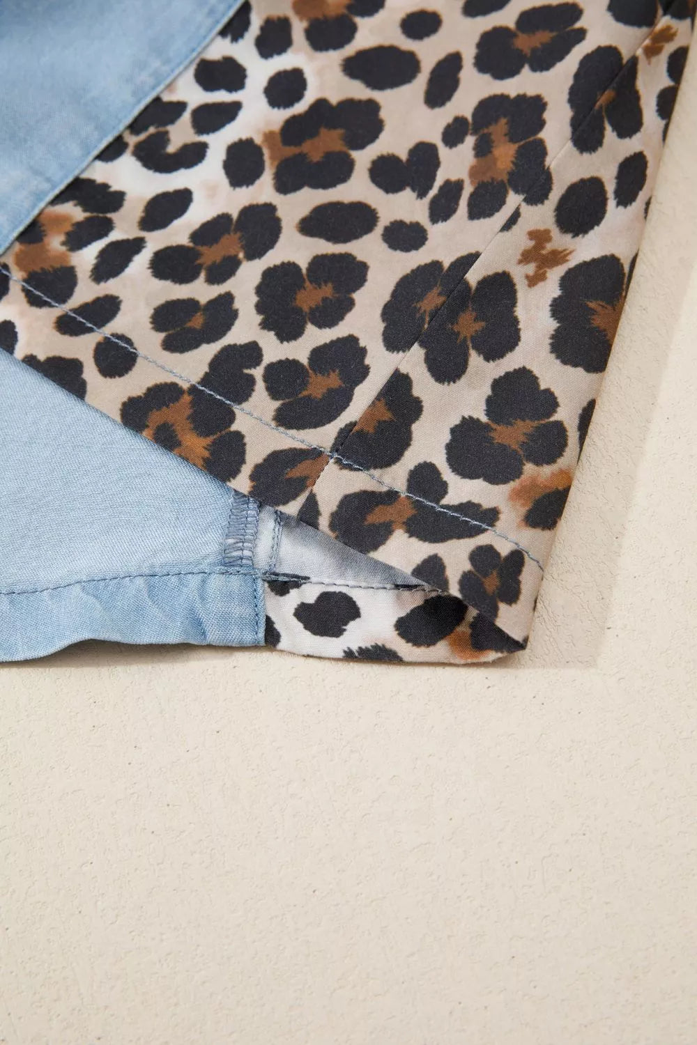 Leopard print panel short sleeve dress by Plush Fashion Hub, featuring a stylish, fitted design with bold animal print fabric.