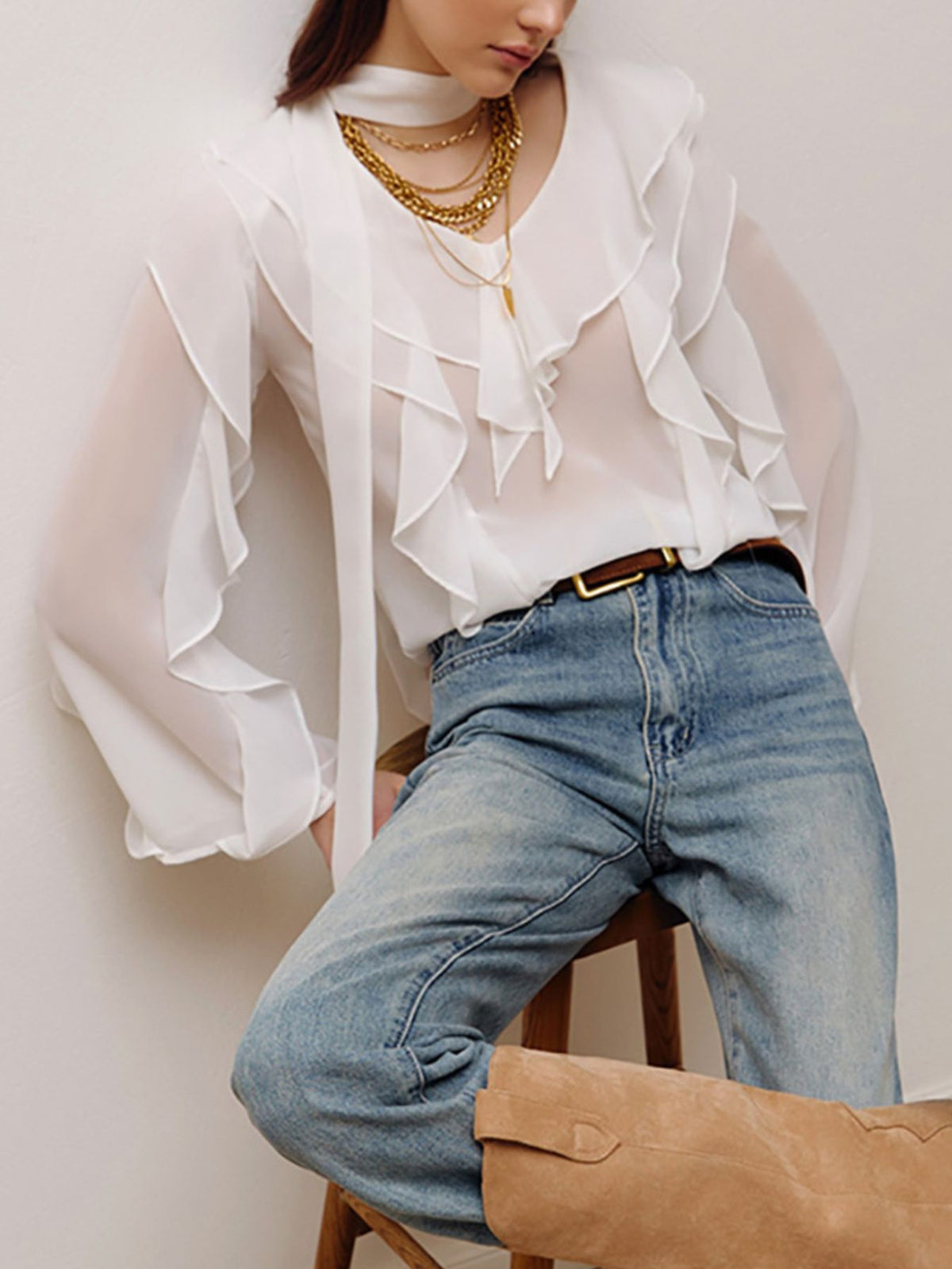 Elegant chiffon blouse with ruffle trim and tie neck from Plush Fashion Hub, showcasing flowy fabric and stylish design.