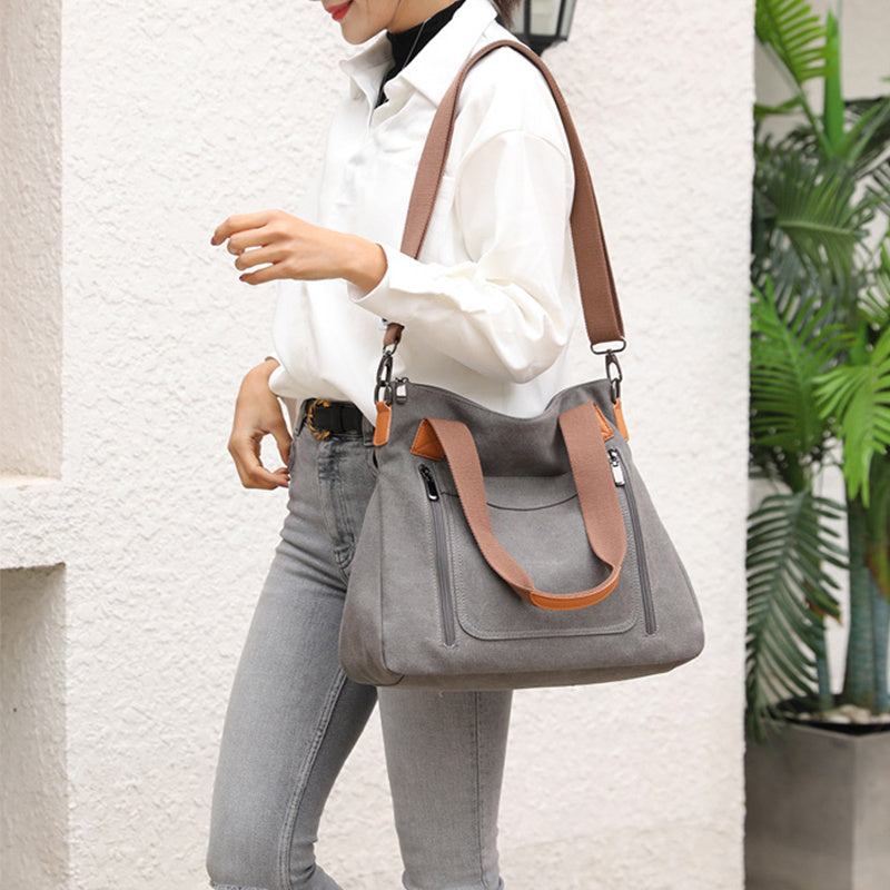 Women Large-capacity Canvas Casual Shoulder BagsBe stylish and organized with our Women's Large-capacity Canvas Casual Shoulder Bags. Made with soft canvas fabric, this bag is perfect for business or casual outingHandbagsPlush Fashions ShopPlush Fashion Shop