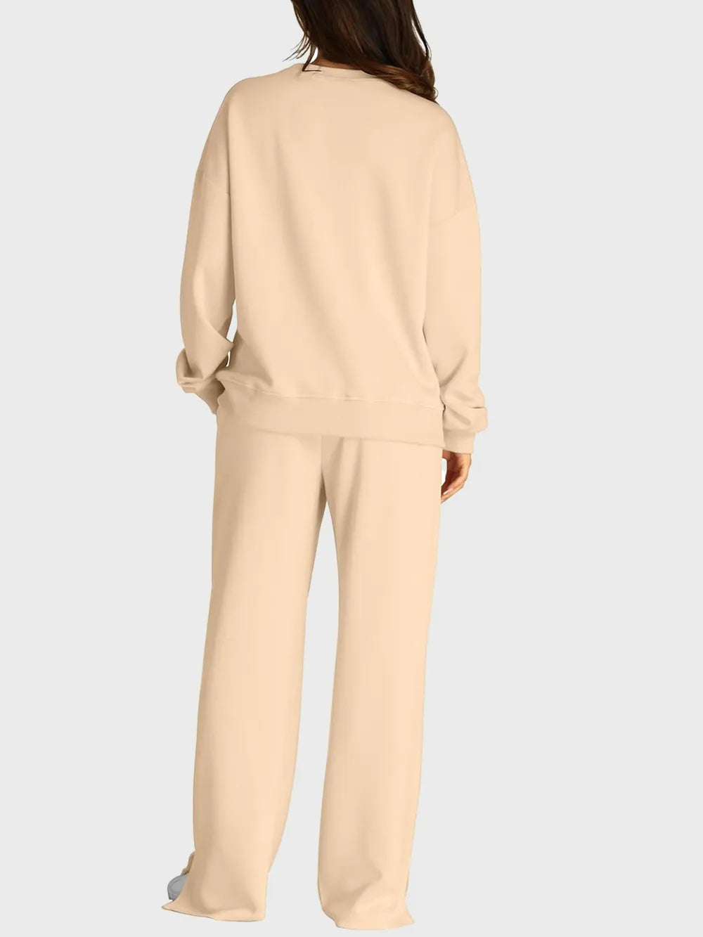 Trendsi round neck long sleeve top and slit pants set, stylish matching outfit with a comfortable fit and modern design.