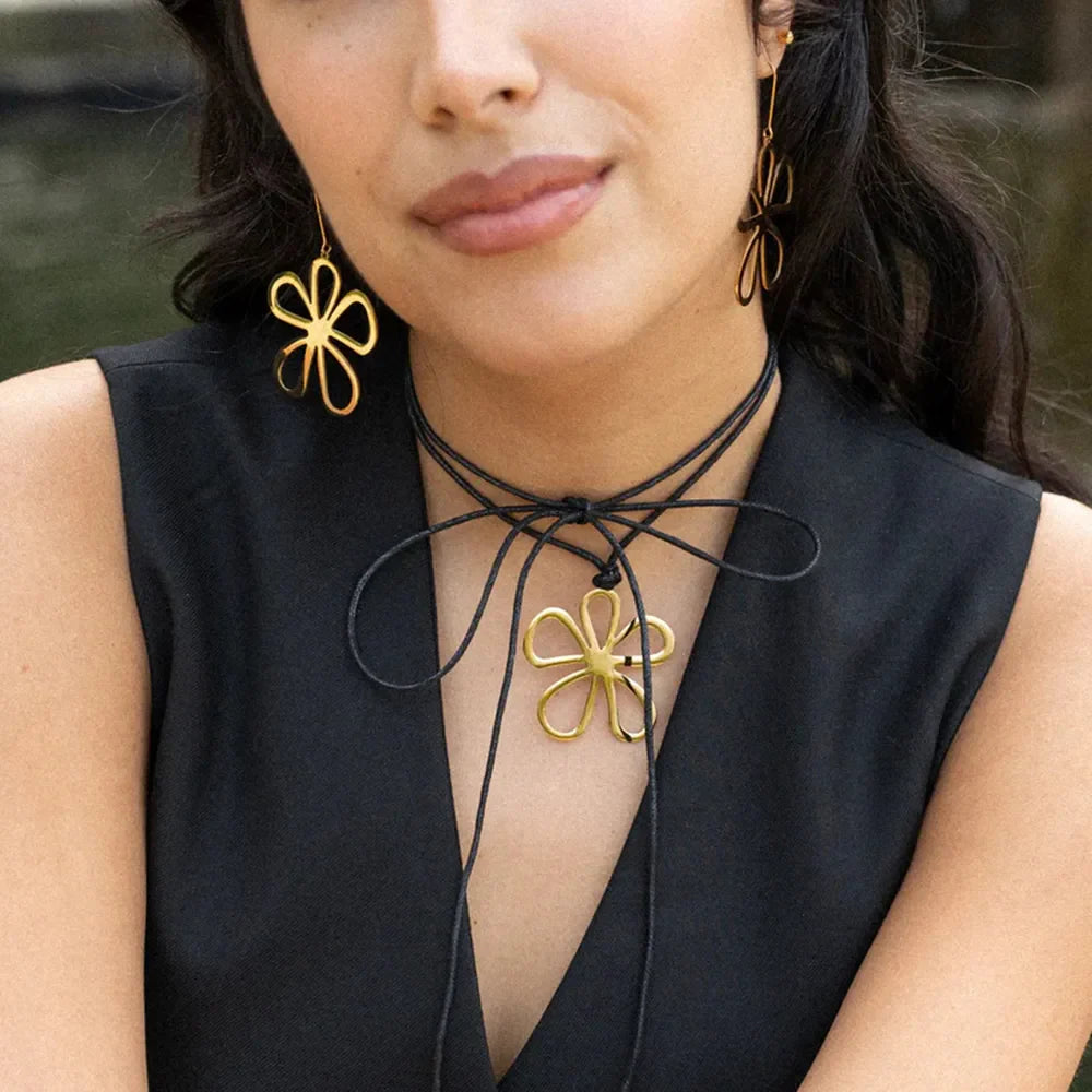 18K gold-plated flower earrings with intricate petal design, stylish jewelry by Plush Fashion Hub.