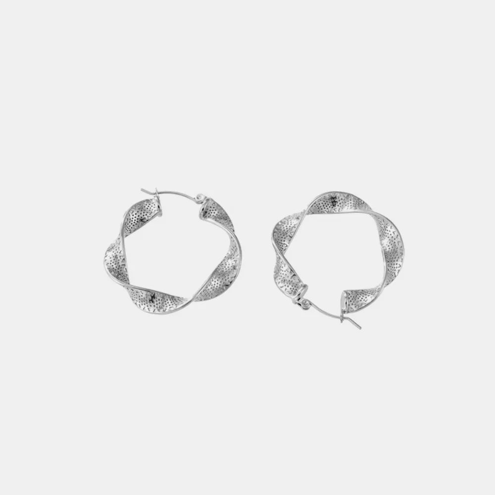 Titanium steel twisted earrings from Plush Fashion Hub, showcasing sleek, modern jewelry design in polished metal.