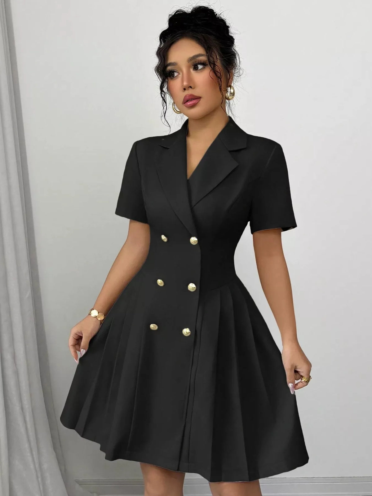 Plush Fashion Hub double-breasted pleated blazer dress with structured fit and classic lapels, styled for a sophisticated look.