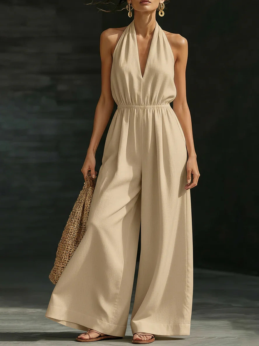 Women’s V-neck halter neck wide-leg jumpsuit by FitiqueFit, casualwear with a stylish V-neck and sleeveless design.