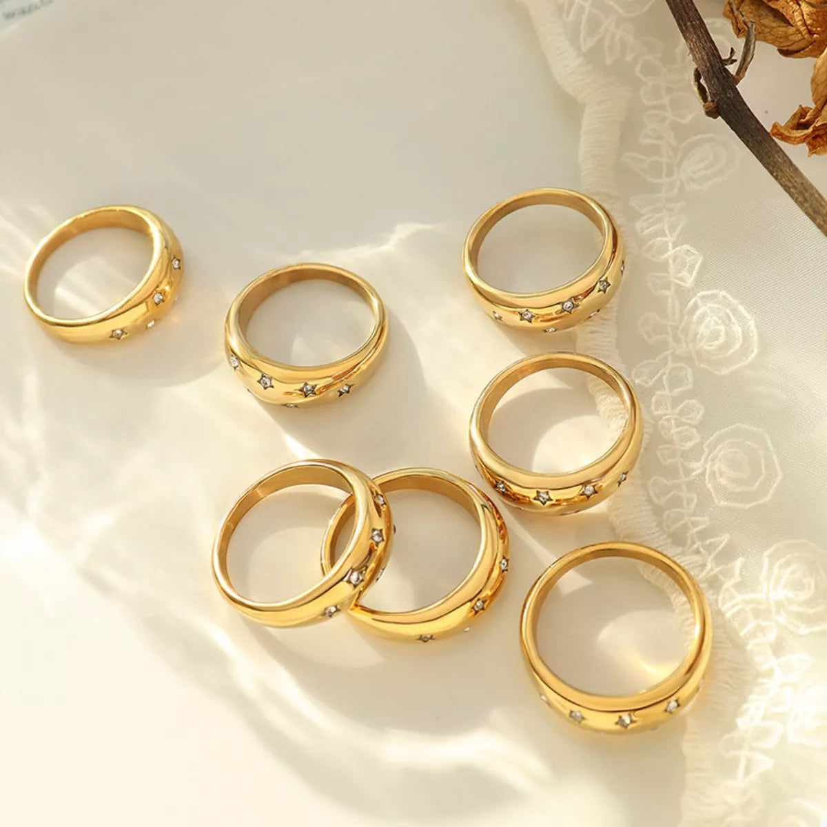 18K gold-plated zircon ring with a sparkling gemstone, featuring a sleek band design from Plush Fashion Hub.