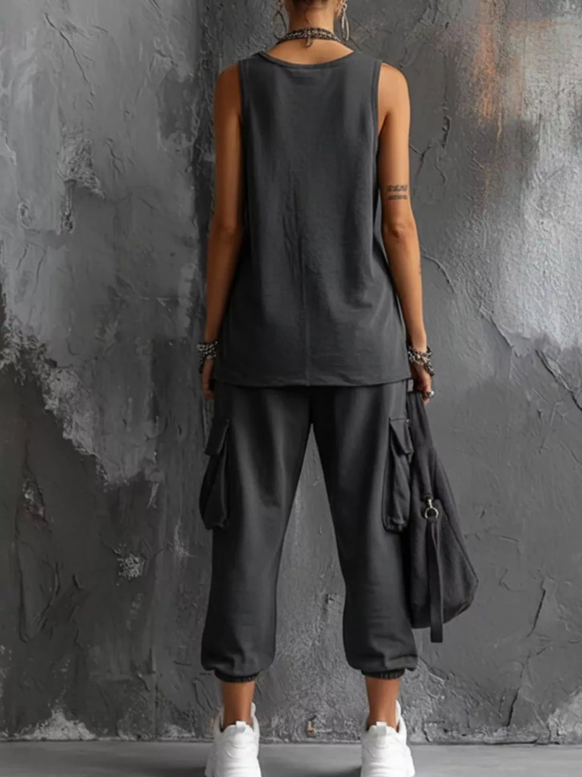 Plus size casual tank top and cargo pants set from Trendsi featuring a relaxed fit in neutral colors.