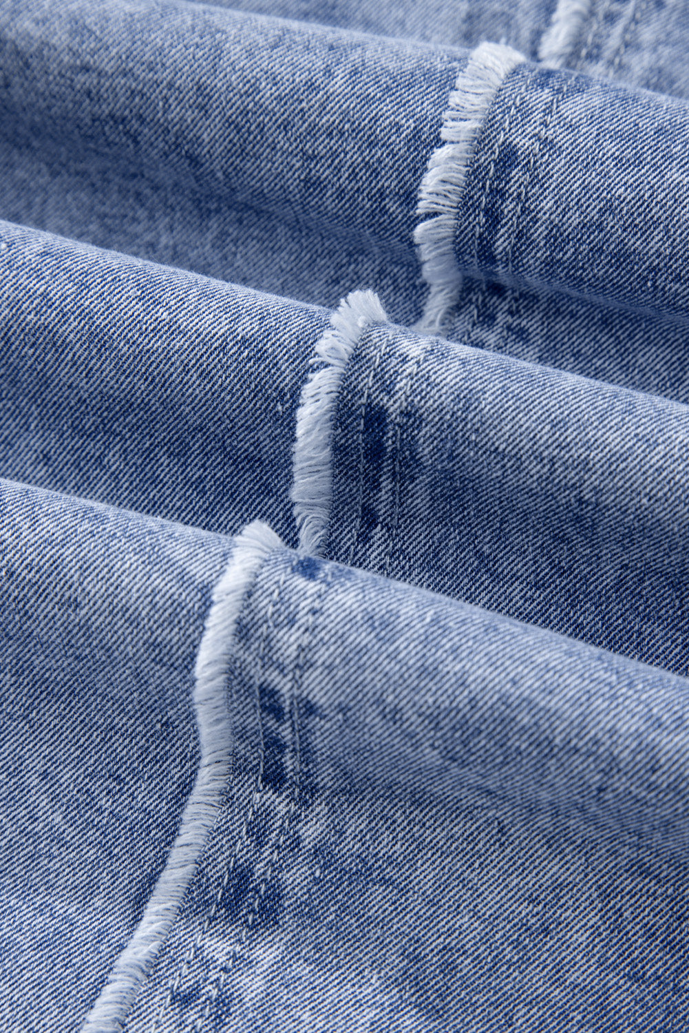 Raw hem button-down long sleeve denim dress by Plush Fashion Hub, featuring a casual fit and stylish raw hem details.