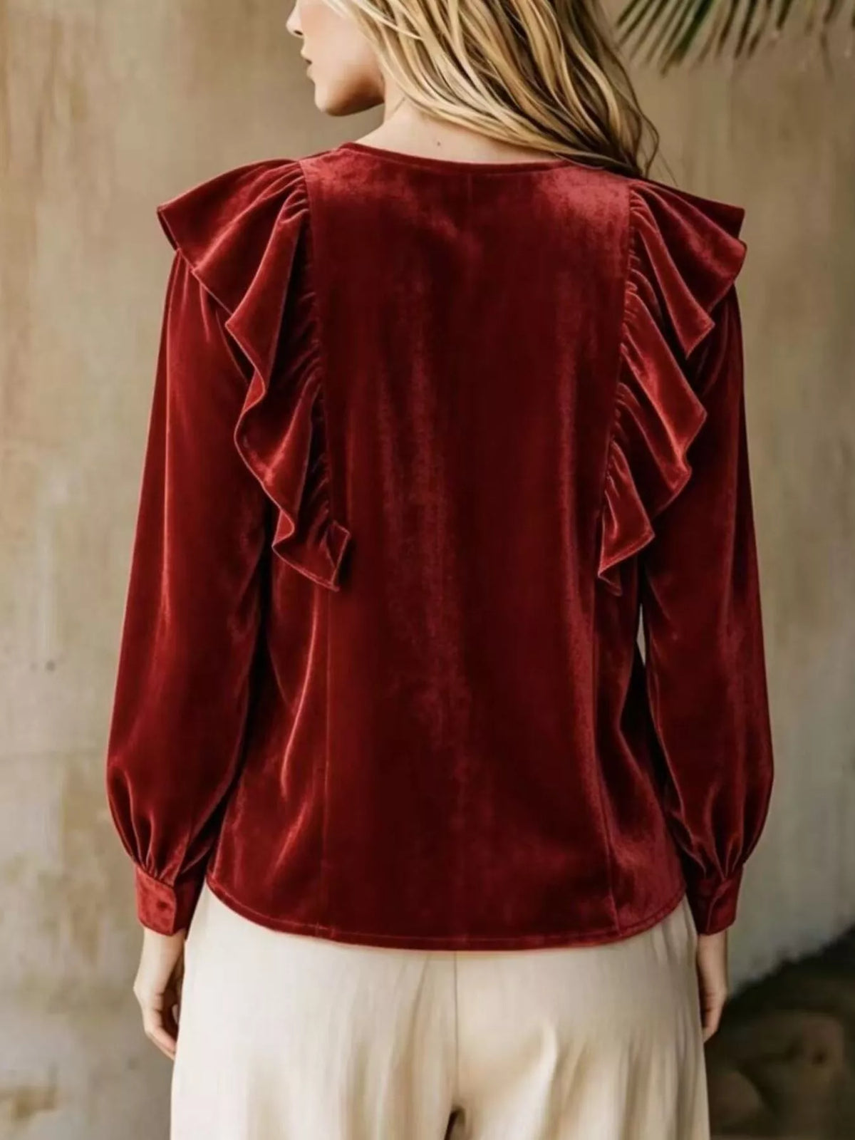 Plus size long sleeve v-neck ruffled blouse in full size, featuring feminine details and comfortable fit, by Trendsi.