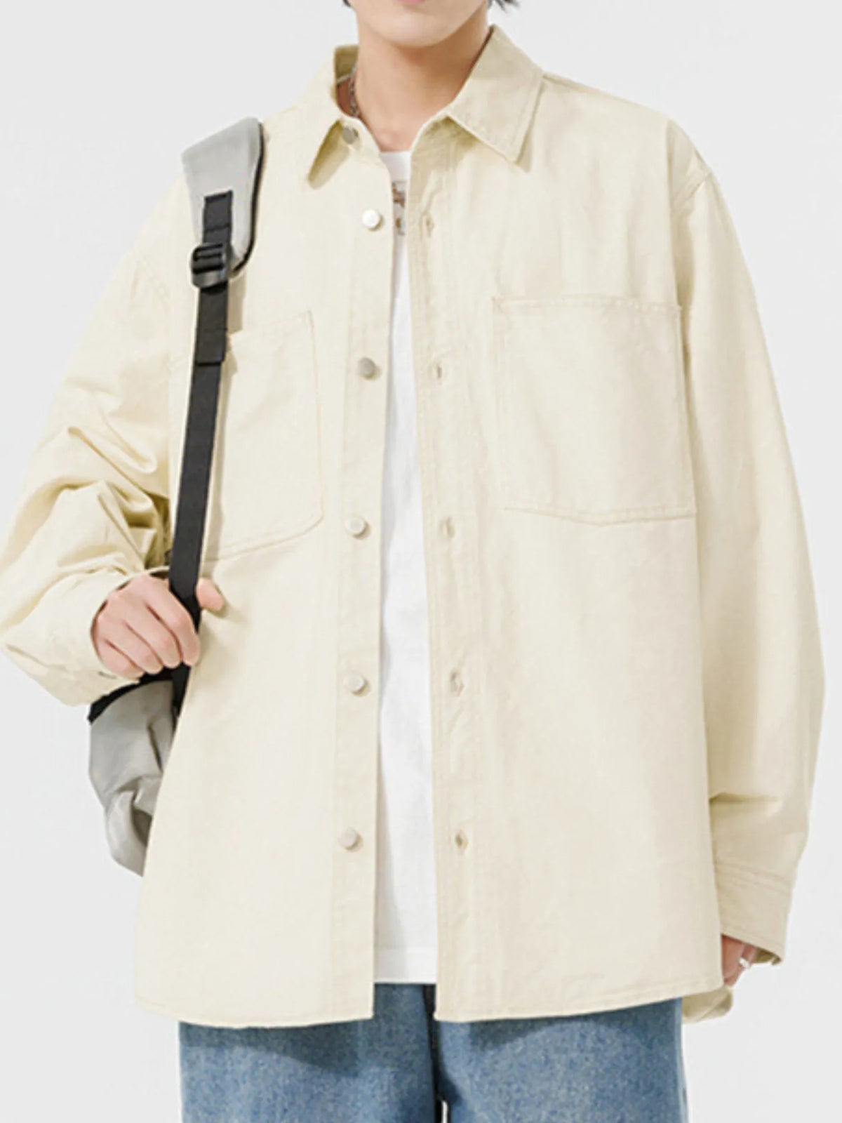 Men's button-up long sleeve shirt by Trendsi, shown in a casual fit with a classic collar and button front.