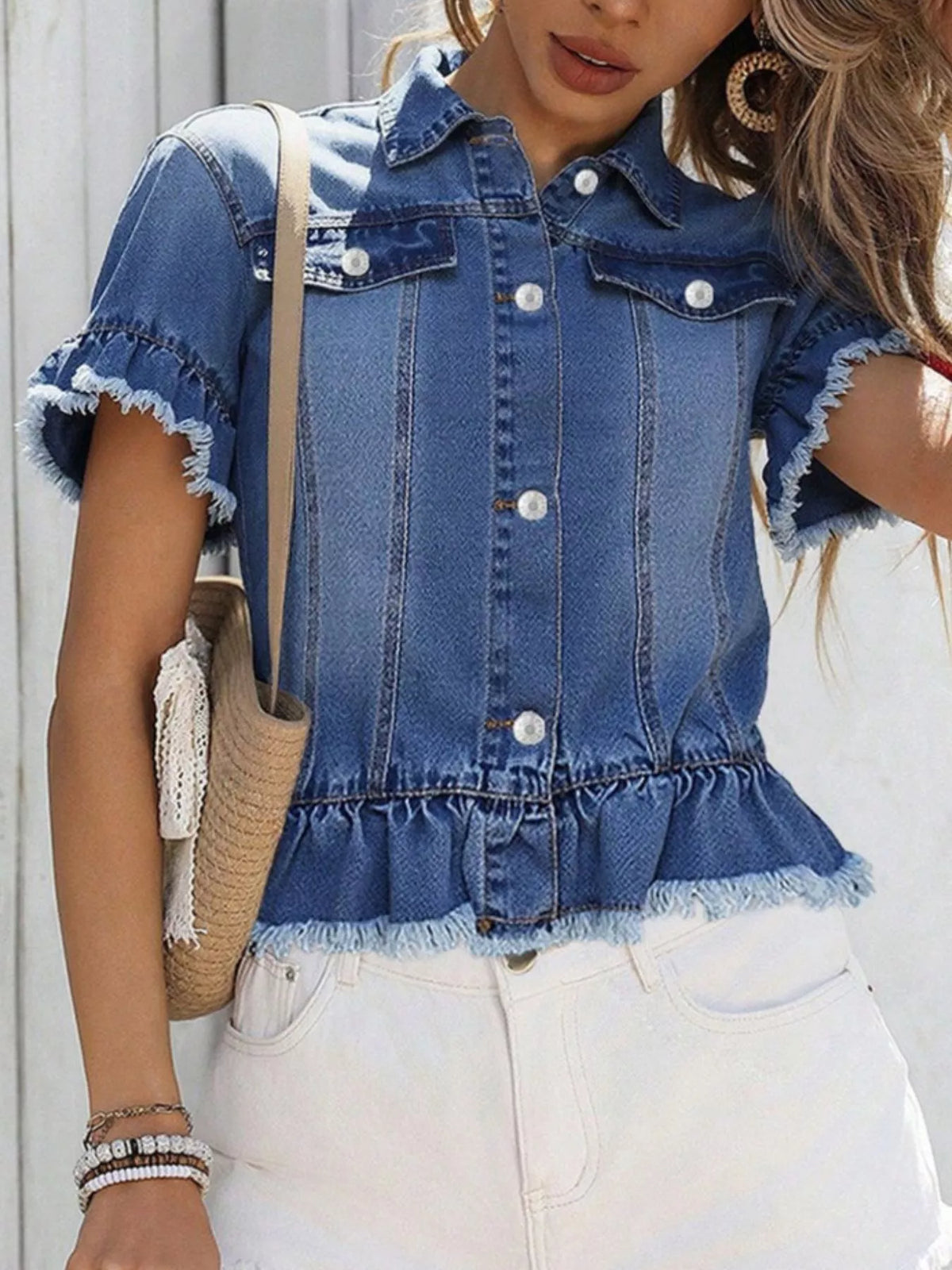 Short sleeve denim jacket with ruffle hem by Plush Fashion Hub, featuring classic design and stylish detailing.
