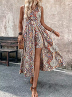 Women's printed V-neck sleeveless jumpsuit by Plush Fashion Hub, casualwear with a chic vacation style, shown on a model.