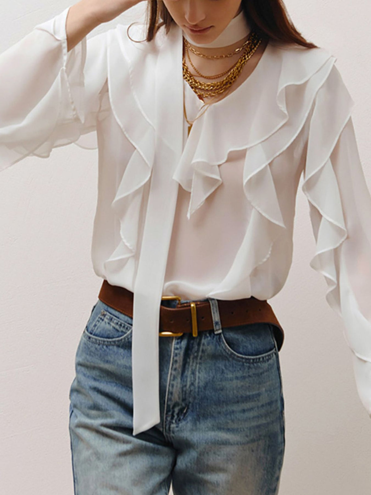 Elegant chiffon blouse with ruffle trim and tie neck from Plush Fashion Hub, showcasing a stylish, feminine design.