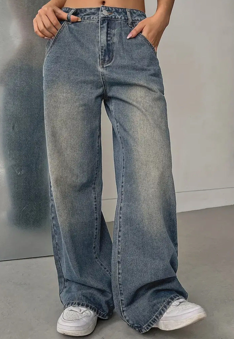European and American women's vintage washed denim jeans by LadyShow.Store, showcasing distressed detailing and classic five-pocket style.