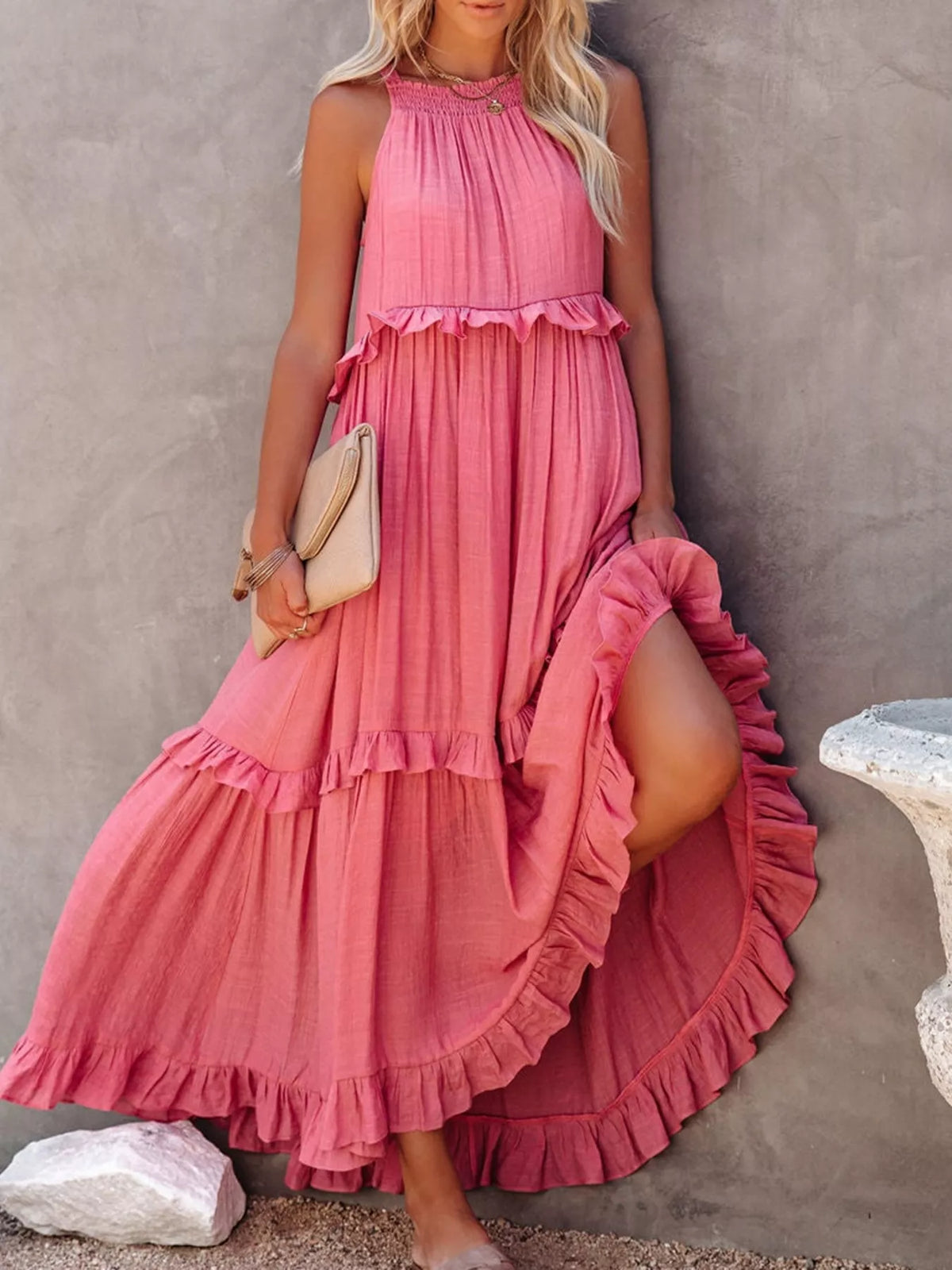 Ruffled tiered sleeveless maxi dress by Plush Fashion Hub featuring flowing fabric and a stylish, layered design.