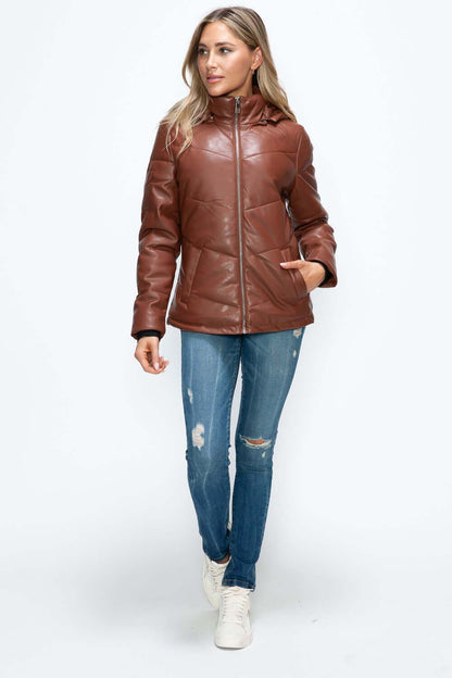 Pocketed zip-up puffer jacket with removable hood in brown pleather.