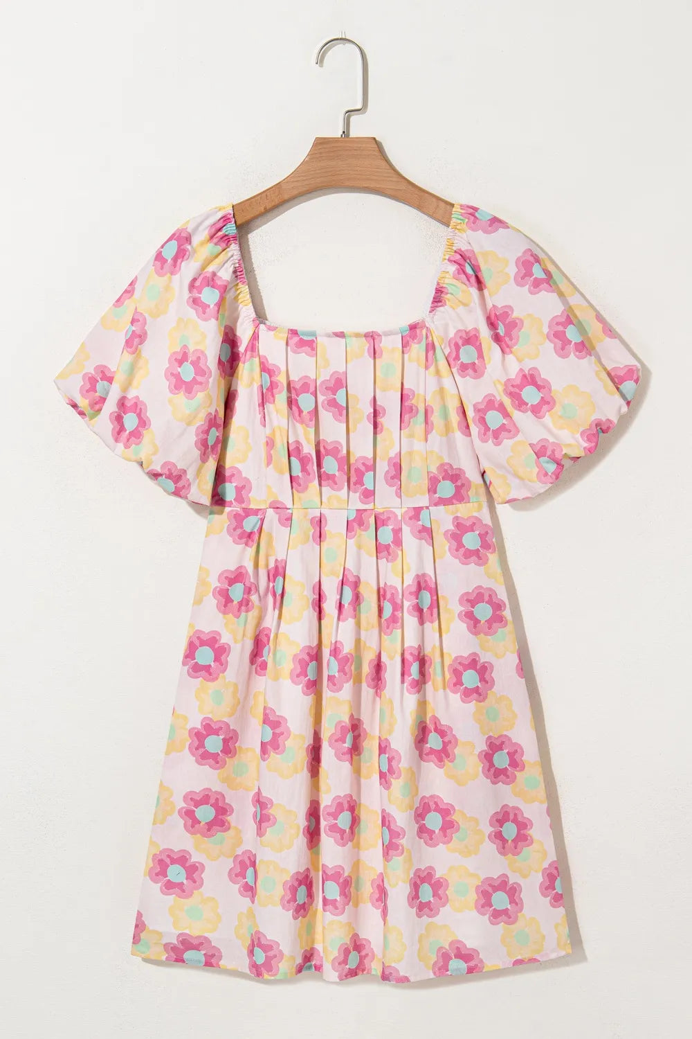 Floral square neck puff sleeve cotton midi dress with pleated flared skirt, featuring a trendy floral pattern and classic design.