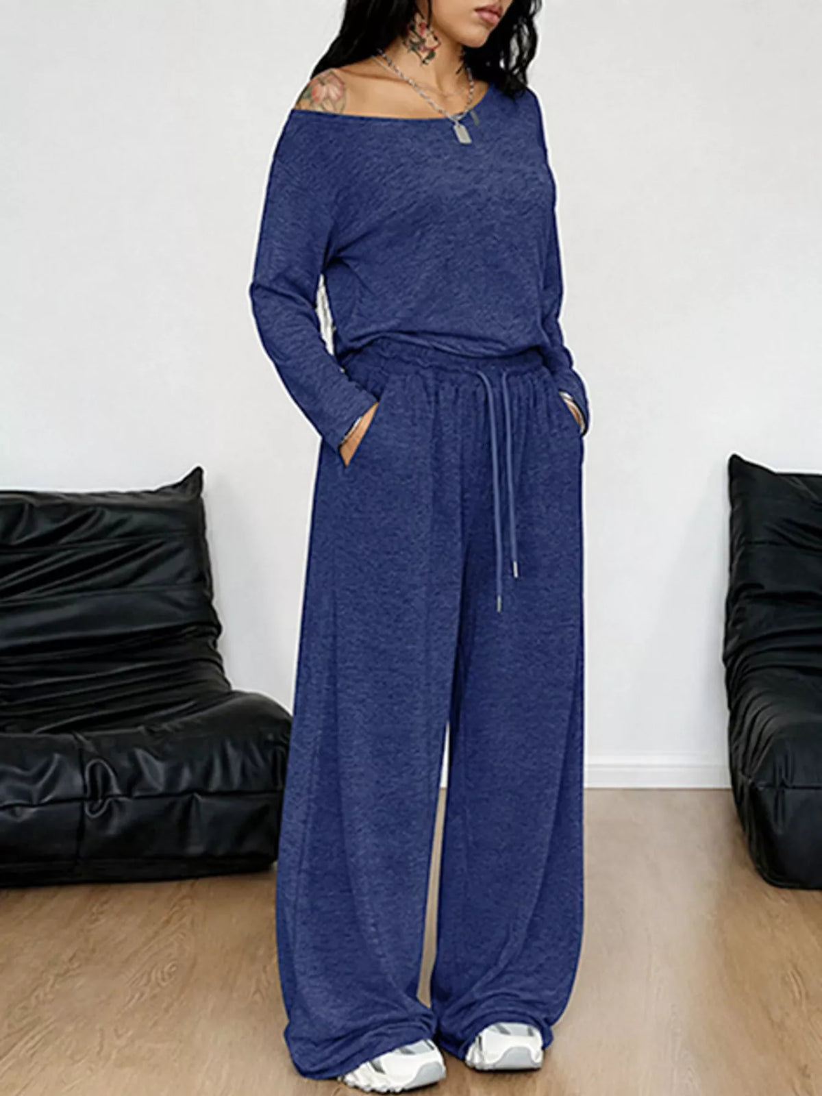 Plus size loose fit one-shoulder T-shirt and pants set by Trendsi, casual matching outfit in soft fabric with relaxed style.