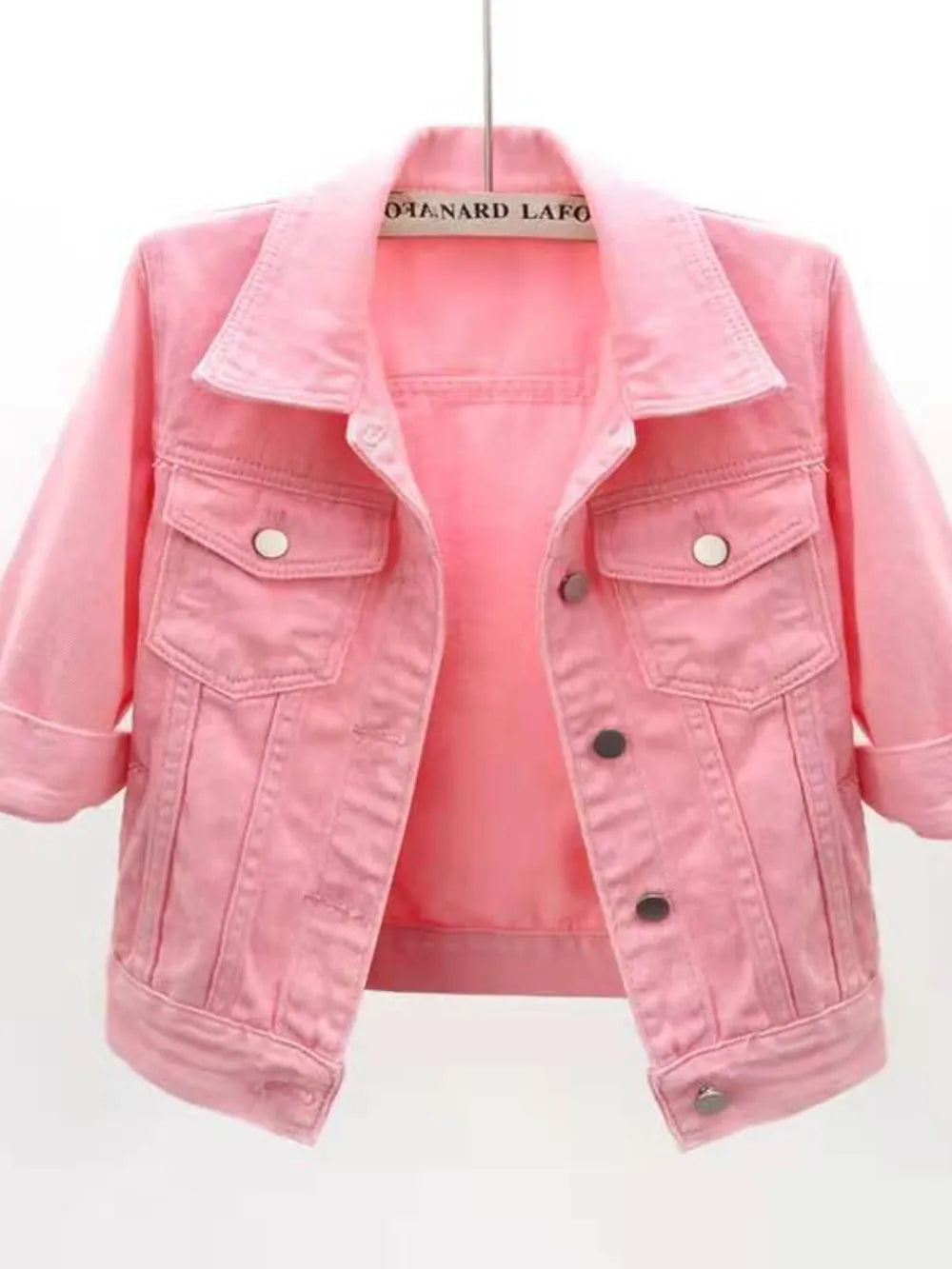 Plus size full length cropped denim jacket from Trendsi, showcasing classic blue denim with button closures and front pockets.