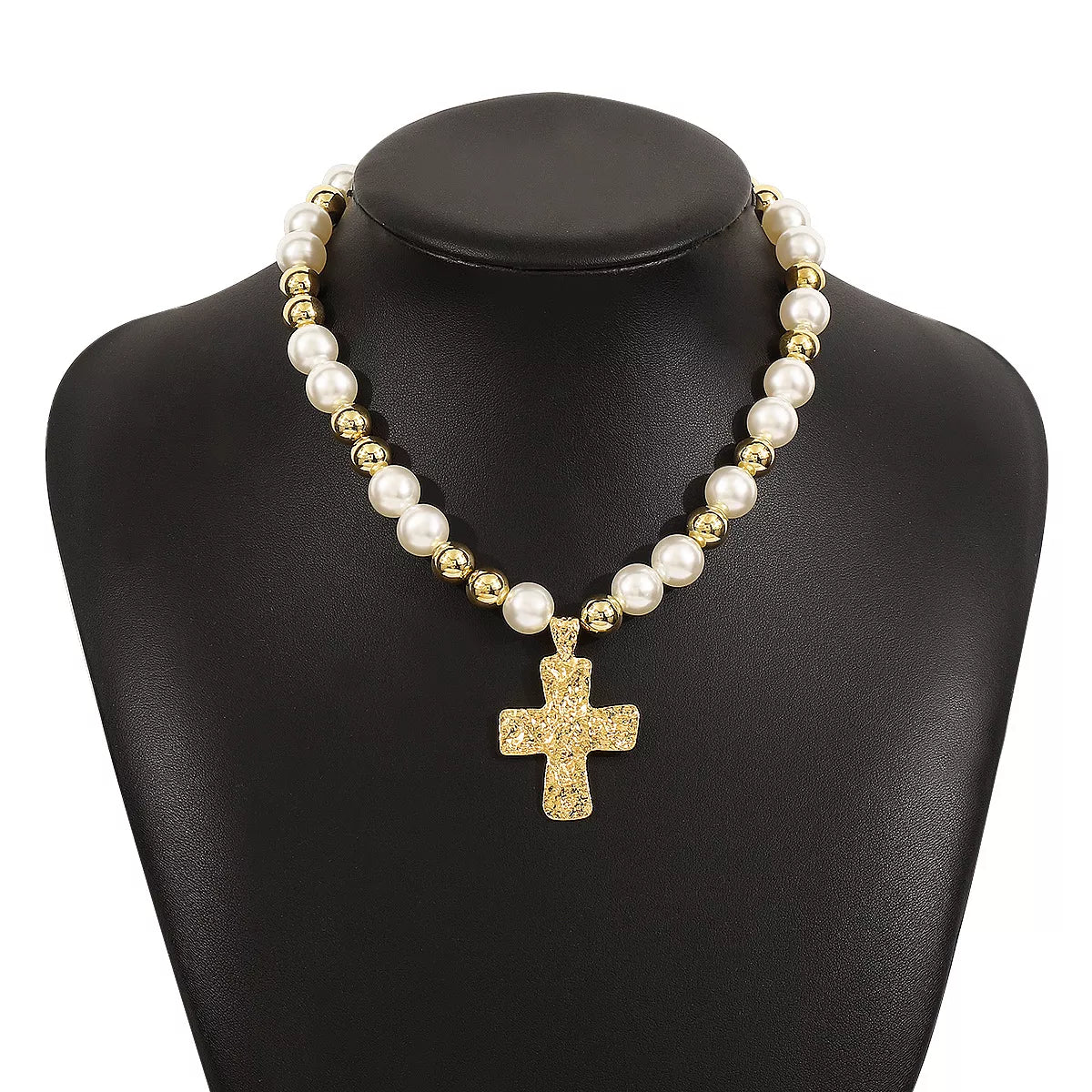 Pearl and cross pendant necklace from Plush Fashion Hub featuring a elegant pearl with a silver cross charm.