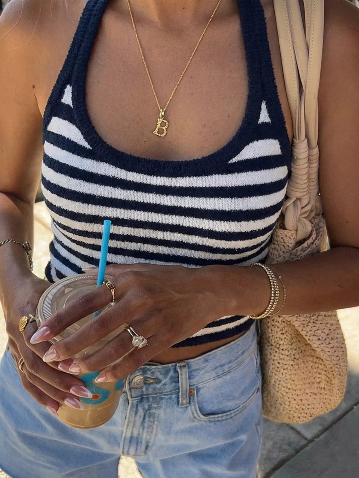 Striped halter neck cami top for women by Plush Fashion Hub, featuring a stylish design and lightweight fabric.