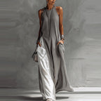 Women's sleeveless off-shoulder maxi dress by FitiqueFit, casualwear style with loose fit and convenient pockets, displayed on a model.