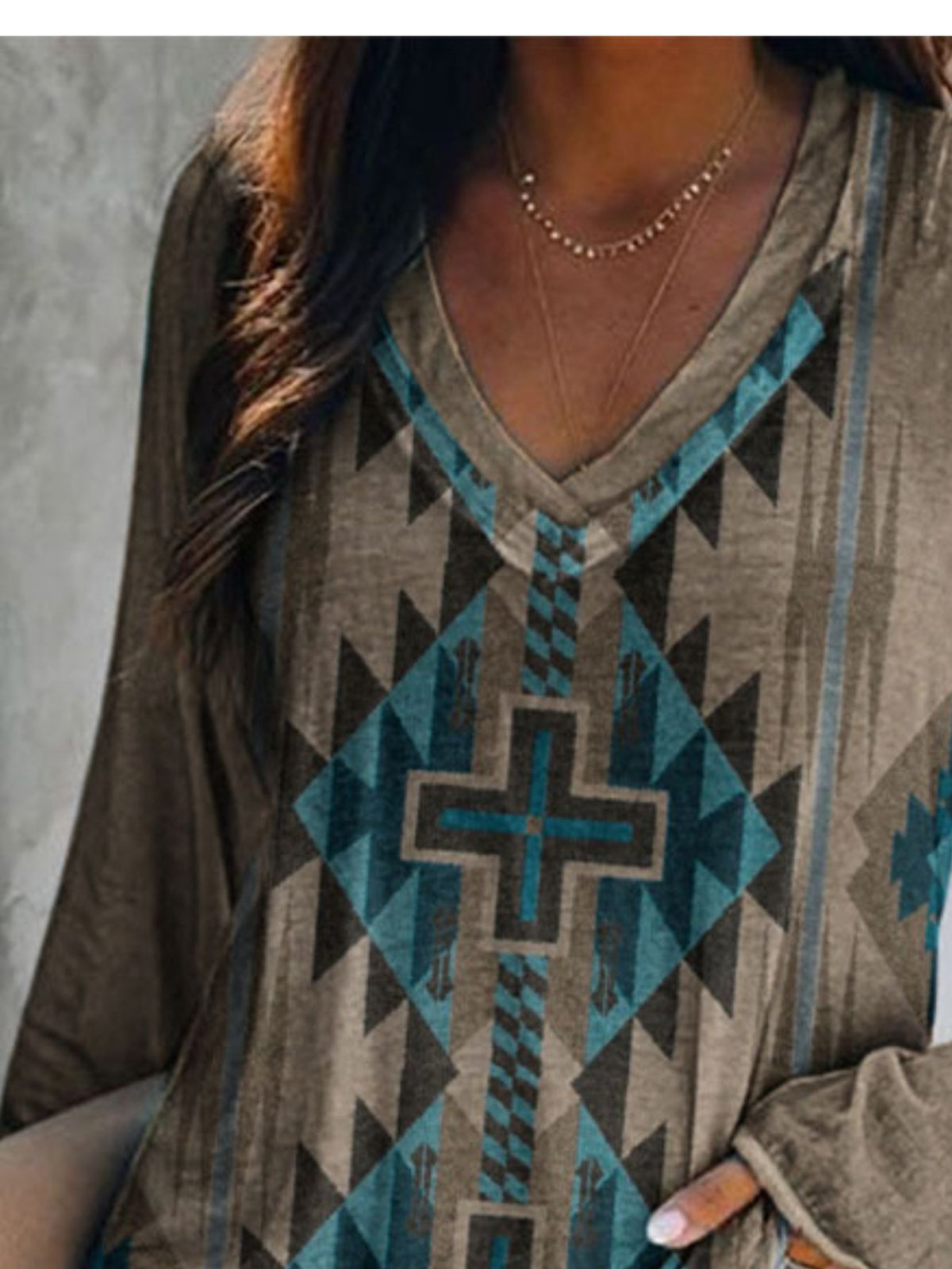 Plus size V-neck long sleeve T-shirt with geometric print in casual style from Plush Fashion Hub, showcasing the front design.