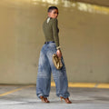 Relaxed Fit Faded Pleated Denim Jeans