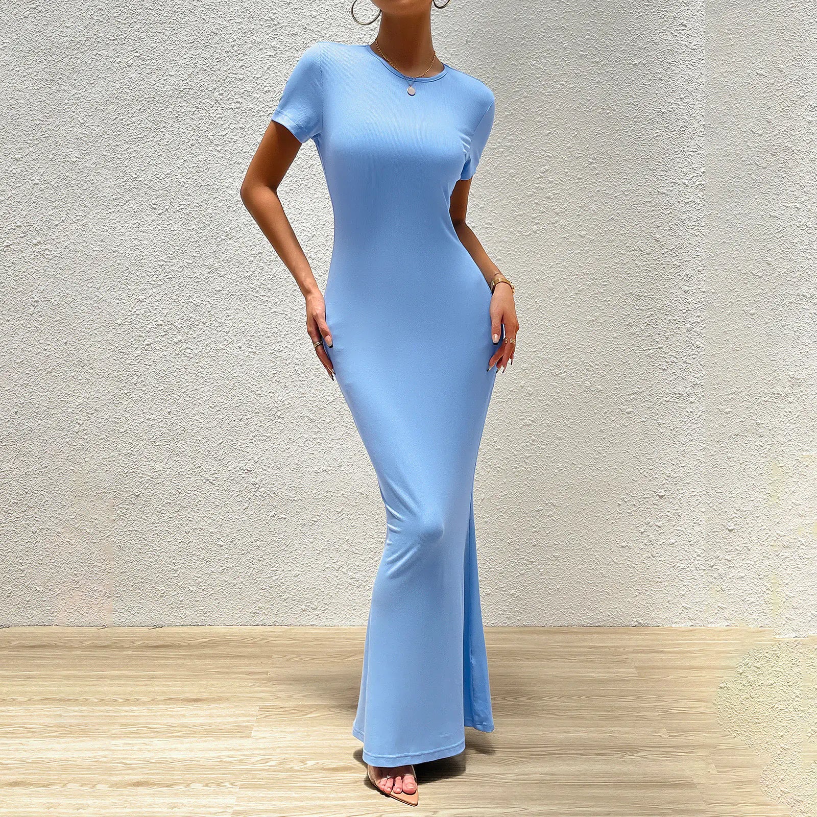 Elegant solid color slim fit women’s round neck dress from Trendy Attic Store01, featuring a sleek, modern design.