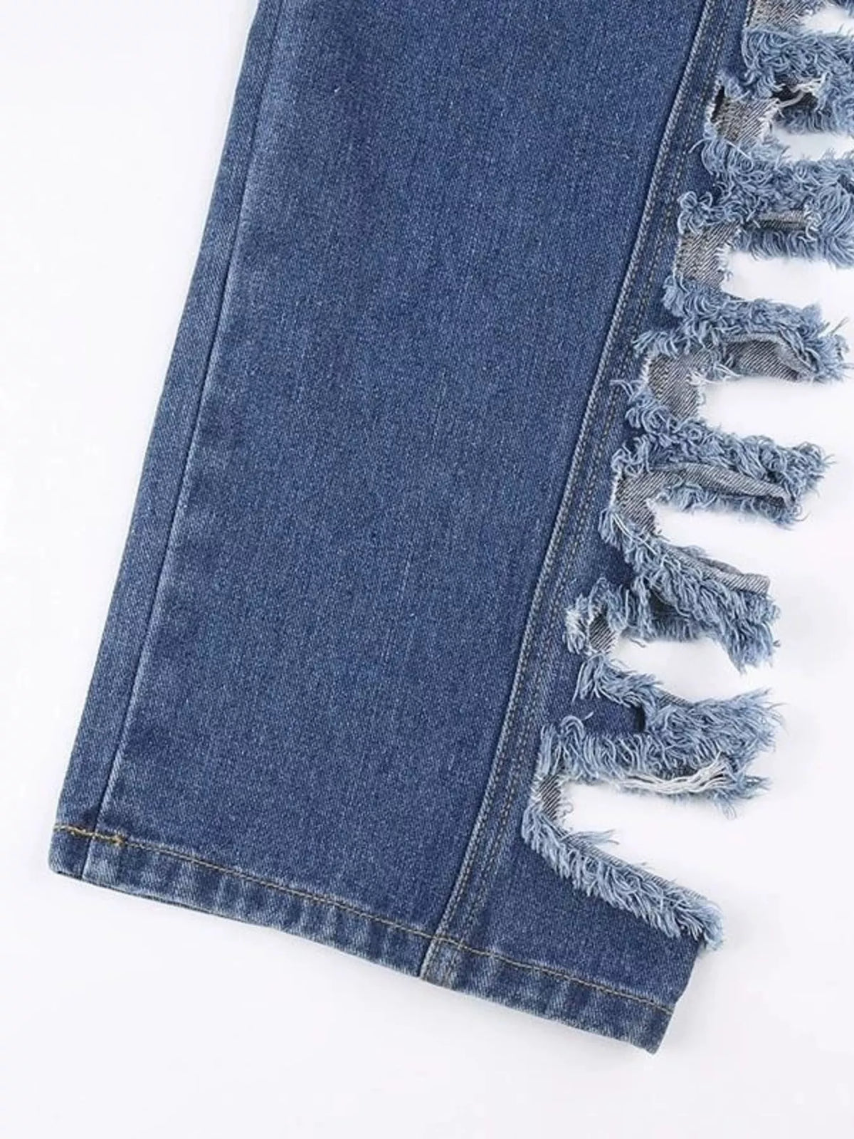Distressed denim jeans from Plush Fashion Hub featuring a side ripped design and classic five-pocket style.