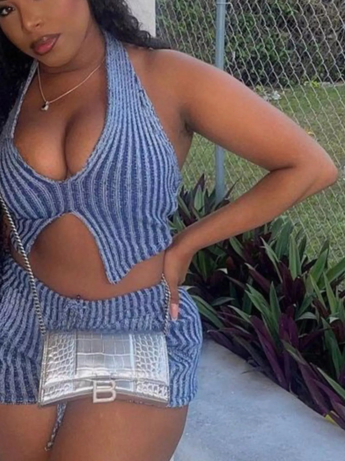 Halter neck sweater top and matching shorts two-piece set from Plush Fashion Hub, casual summer outfit, front view.