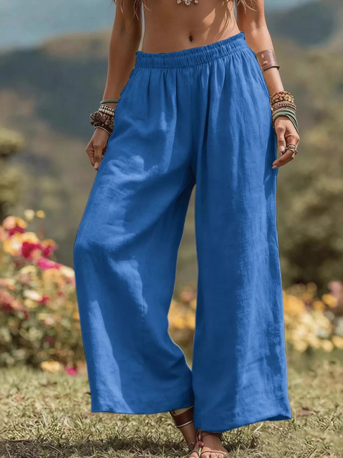 Bohemian wide-leg pants in full size and plus size, featuring a relaxed fit and flowy fabric, styled for casual wear.