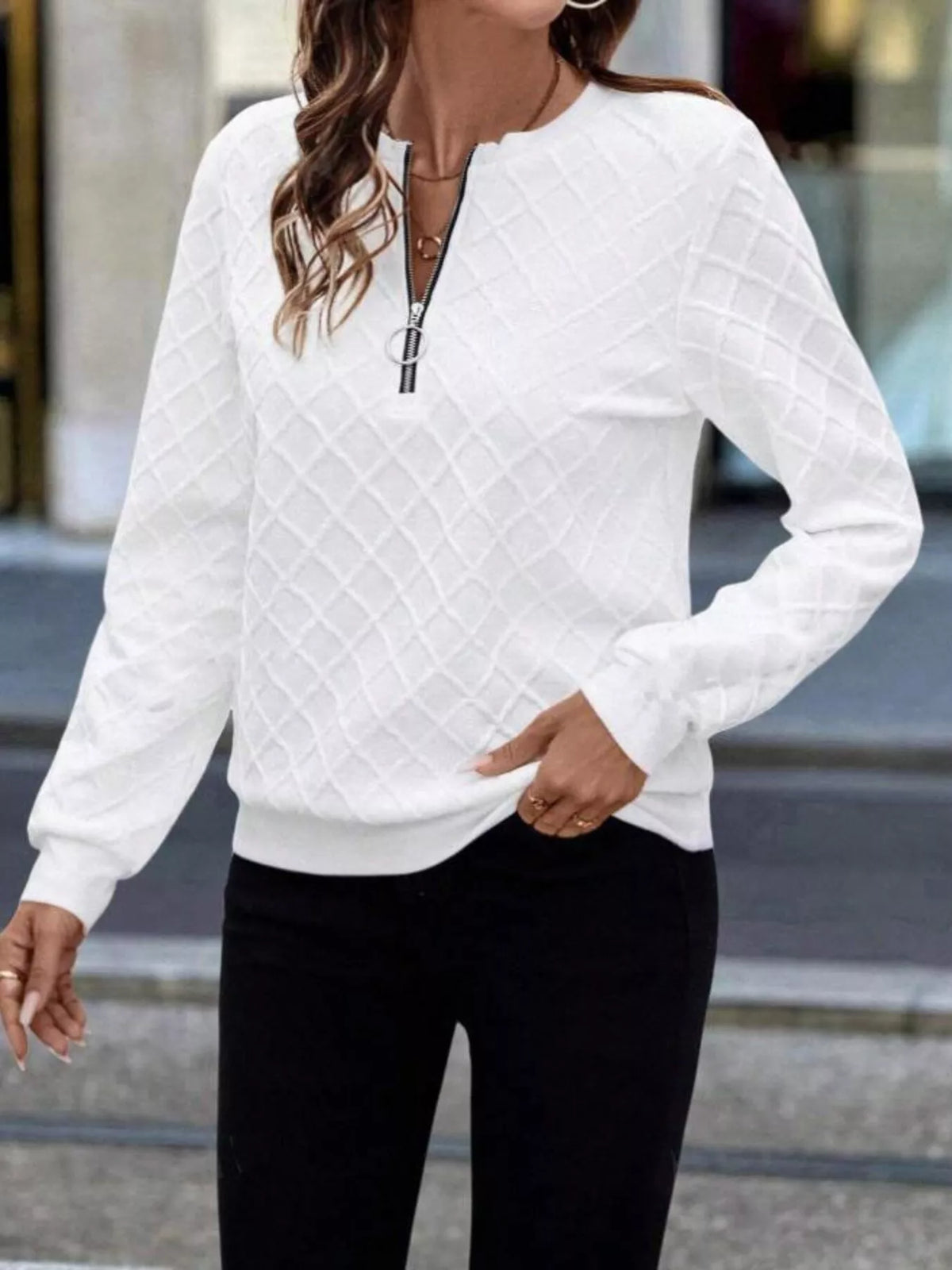 Textured plush quarter-zip sweatshirt from Plush Fashion Hub, showing the soft fabric and stylish fit in a casual setting.