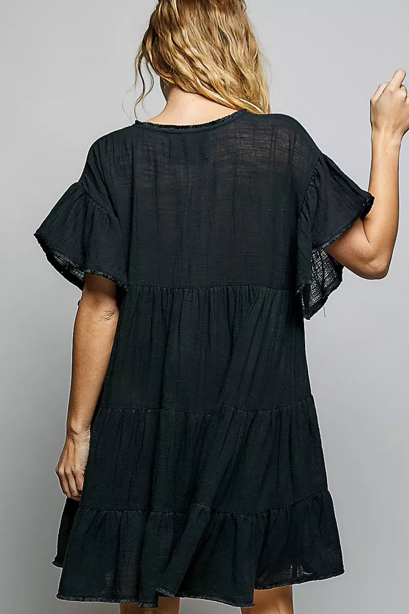 Cotton ruffle shirred V-neck short sleeve dress by Plush Fashion Hub, featuring a feminine design and comfortable fit.