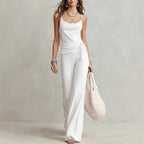 Women's solid color sleeveless top and pants two-piece casualwear set by FitiqueFit, featuring a comfortable sleeveless top and matching pants.
