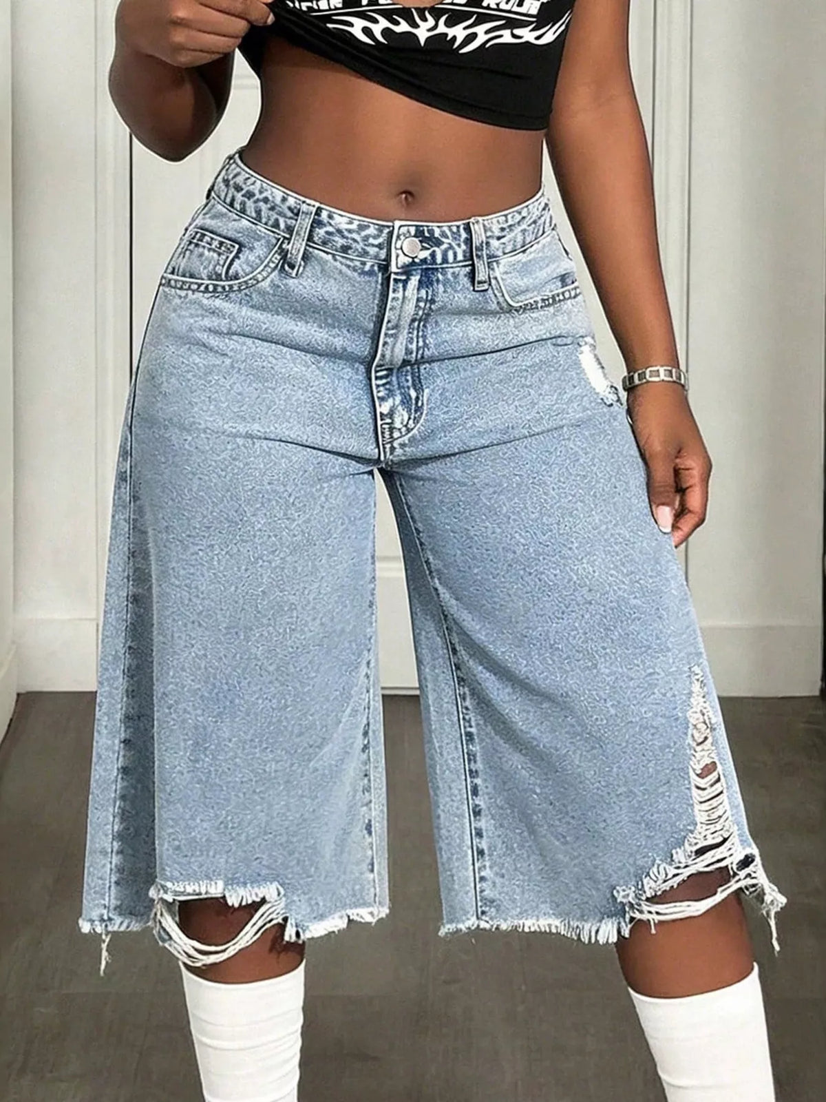 Plush Fashion Hub distressed wide-leg denim shorts with frayed edges and a casual fit, featuring a high-rise waist and light wash.