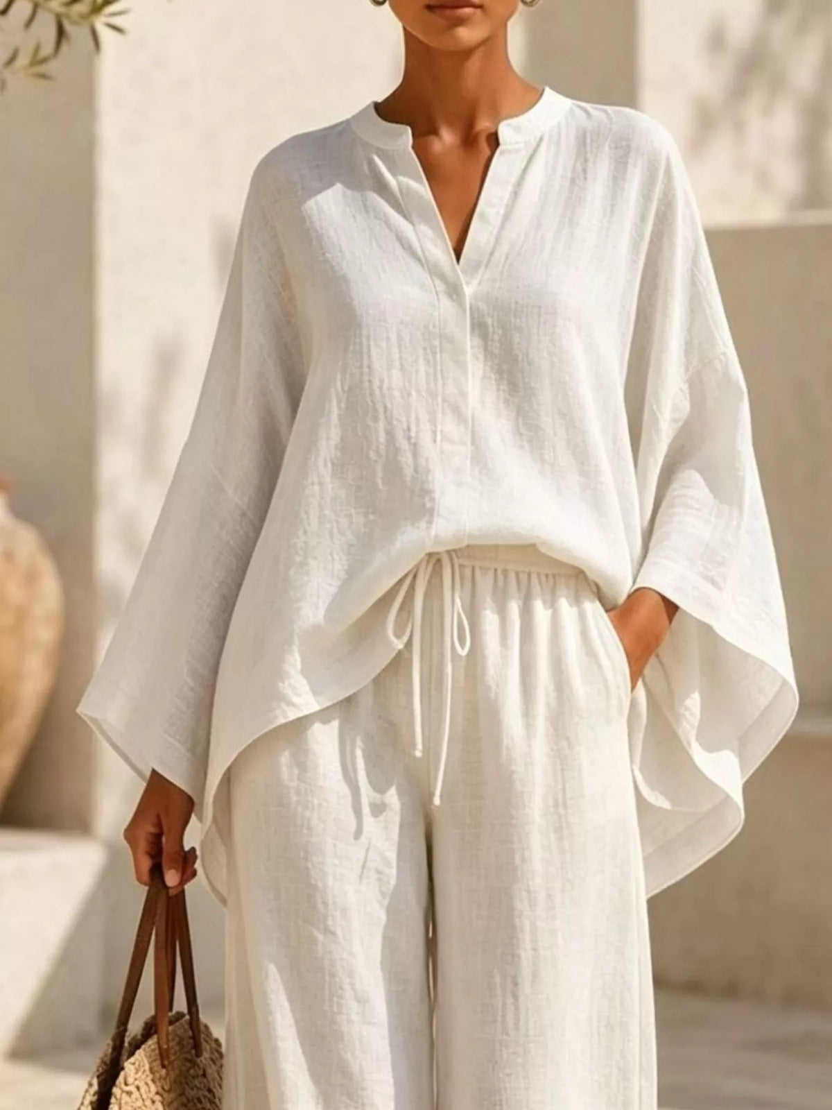 Plus size plush fashion hub loungewear set with notched long sleeve top and wide-leg pants in comfortable, stylish design