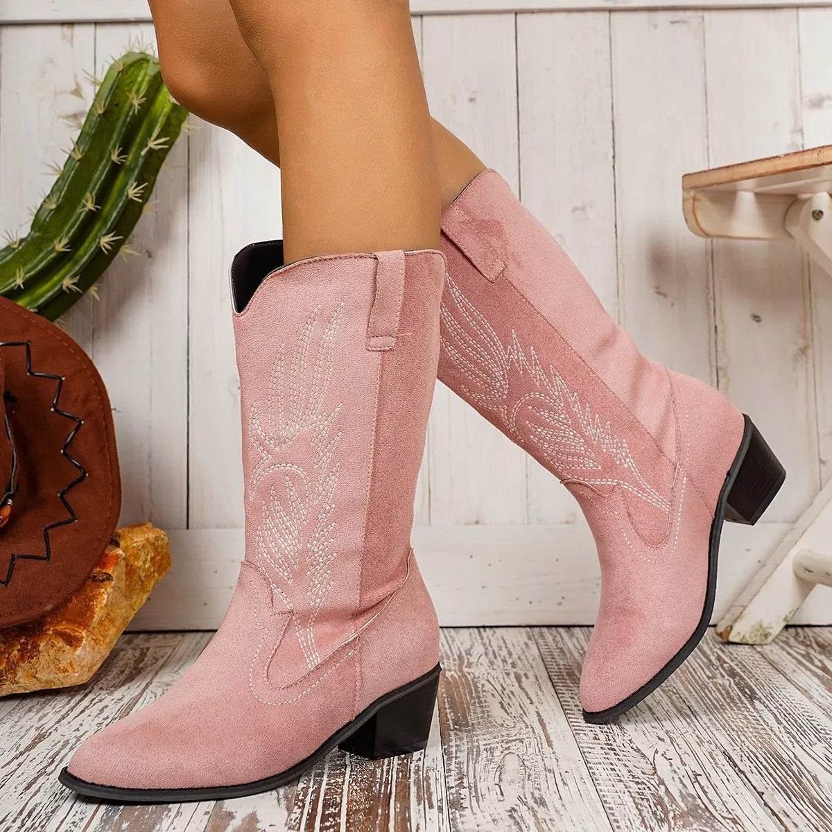 Point toe block heel boots by Trendsi featuring sleek design, ankle height, and sturdy block heels.